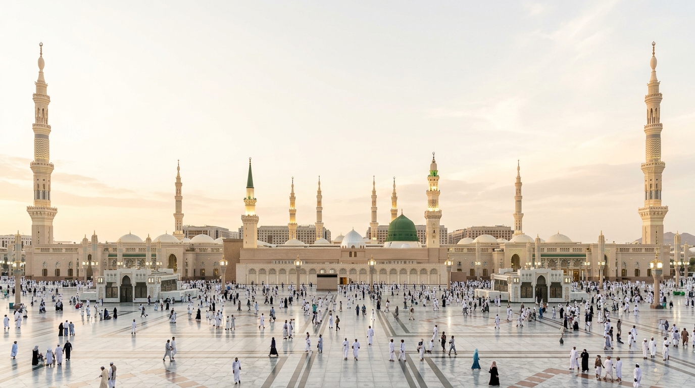 Panoramic view of the Prophet's Mosque courtyard in Madinah with minarets in clear morning light